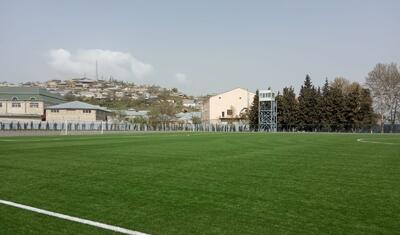Bu rayonda yeni tikilmiş stadionu bir də belə görün -
