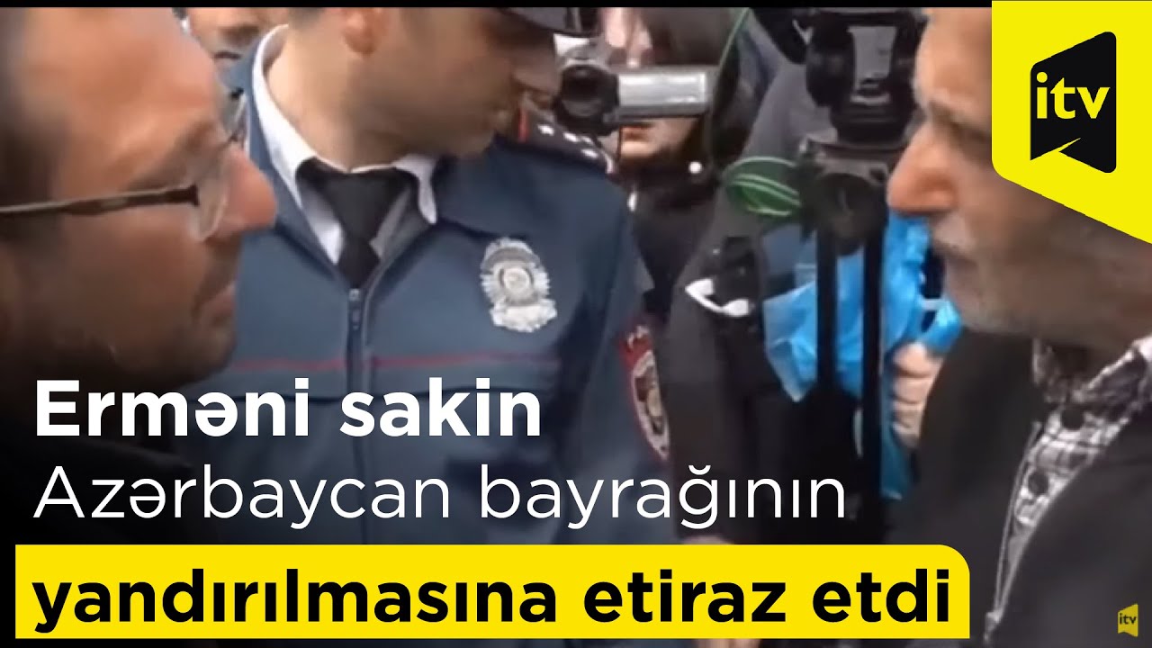 Erməni sakin Azərbaycan bayrağının yandırılmasına etiraz etdi - VİDEO